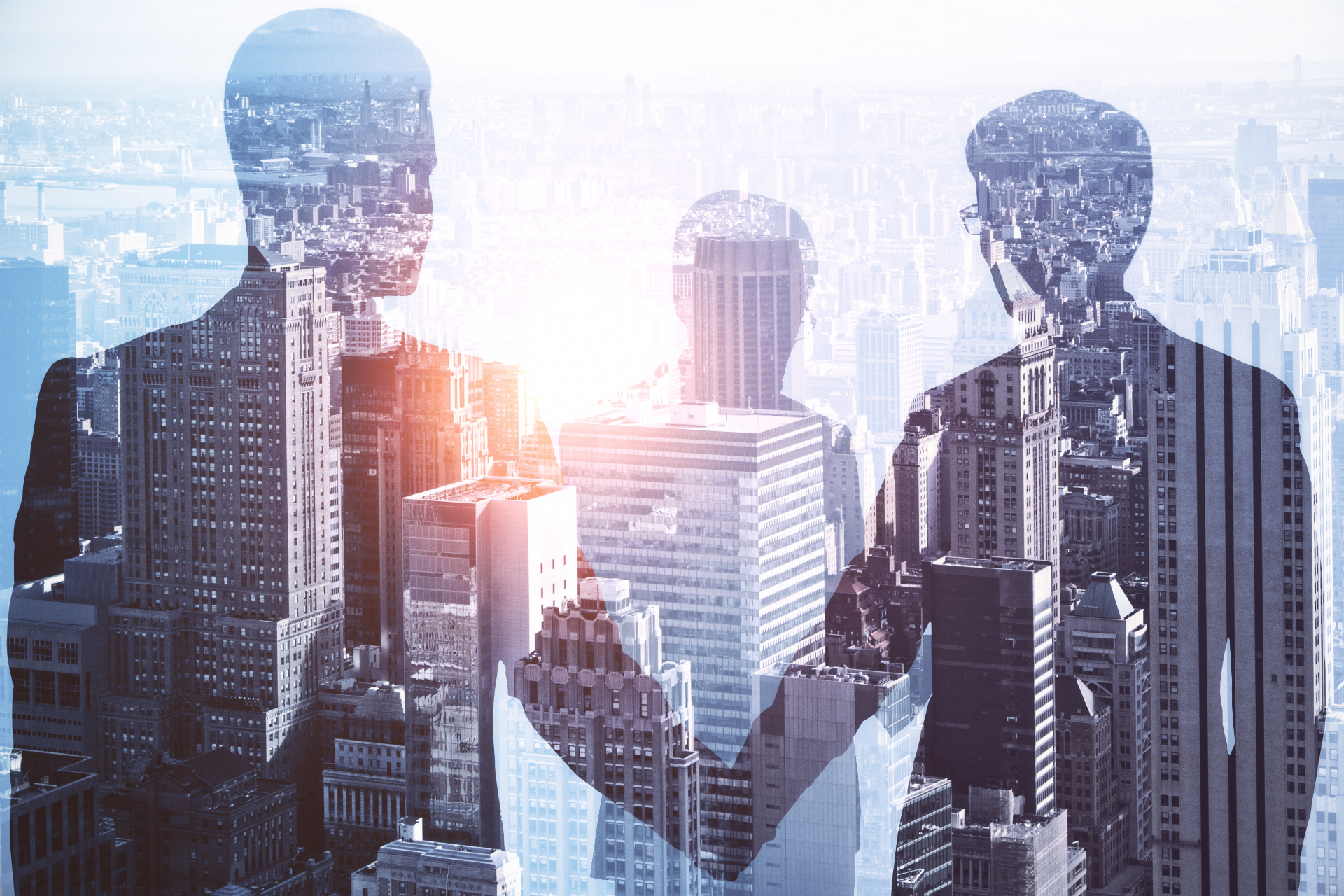 Velaro Group team — silhouettes of business partners against the Chicago skyline
